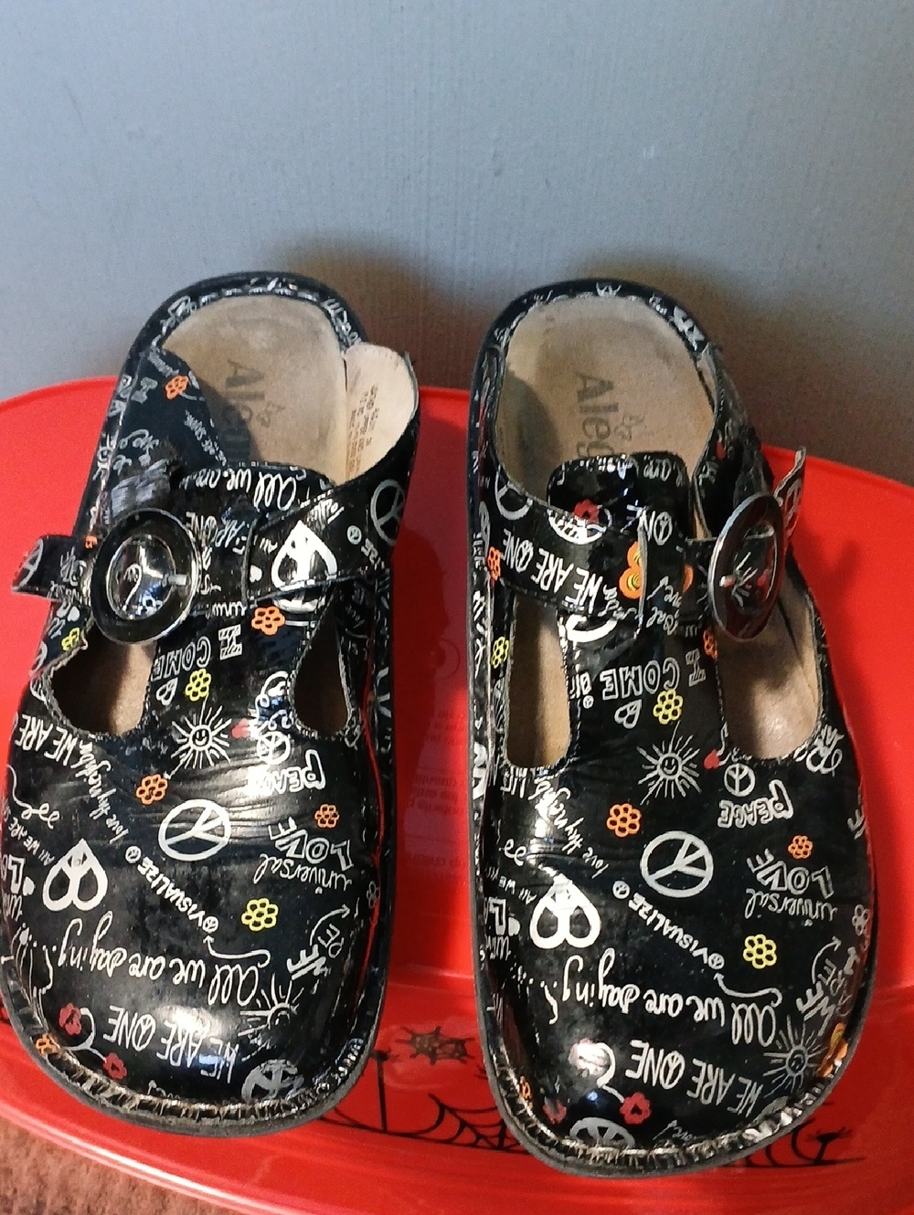 Alegria Black Patent Mary Jane Clogs with Multicolor Peace & Heart Print